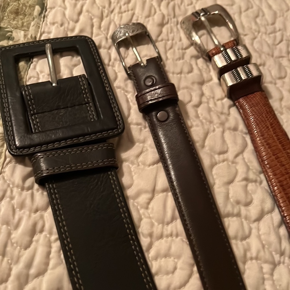 Three Silver Buckle Leather Belts